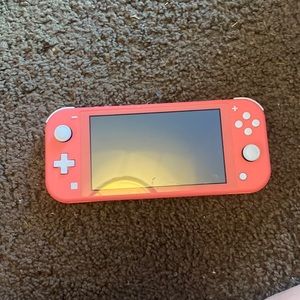 nintendo switch lite- coral